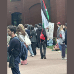 George Washington University Anti-Israel Protestor Carries Sign Calling for “Final Solution” Against Jews